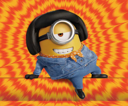 Stuart from *Minions: The Rise of Gru* poses playfully, wearing a denim outfit and a bandana, set against a vibrant, swirling orange background in this HD wallpaper.