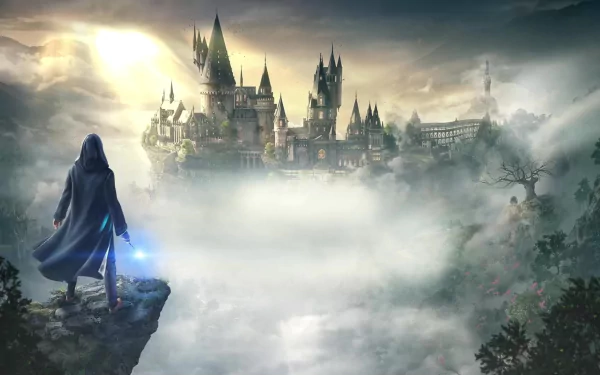 HD PC desktop wallpaper featuring a cloaked figure with a wand overlooking the foggy, majestic Hogwarts castle from the video game Hogwarts Legacy.