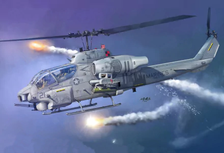 Military Bell AH-1 SuperCobra attack helicopter firing rockets over the ocean at dusk, 2K Quad HD PC desktop wallpaper/background.