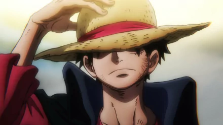 HD anime desktop wallpaper featuring Monkey D. Luffy from One Piece, shading his eyes with his iconic straw hat against a bright sky background.