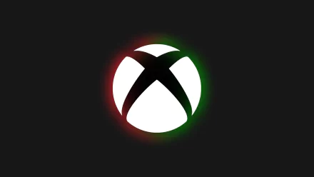 Xbox logo illuminated in red and green on a black background, HD desktop wallpaper.