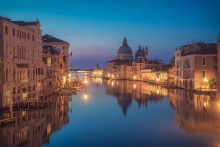A stunning 4K Ultra HD view of Venice's Grand Canal at dusk, showcasing Italy's iconic man-made waterways and historic architecture.