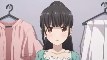 HD PC wallpaper of Yume Irido from the anime My Stepmom's Daughter Is My Ex. — close-up of a blushing, long dark‑haired girl standing among hanging clothes.