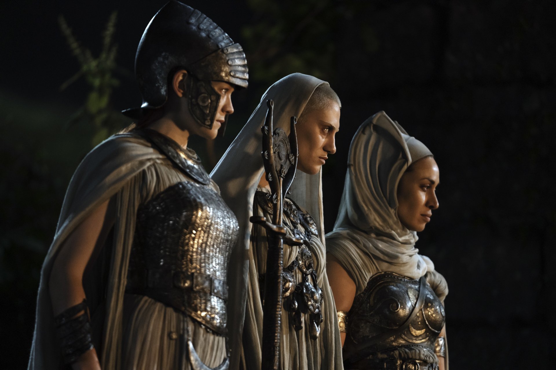 Three armored characters from The Lord of the Rings: The Rings of Power stand side by side in a detailed 4K Ultra HD desktop wallpaper from the TV show.