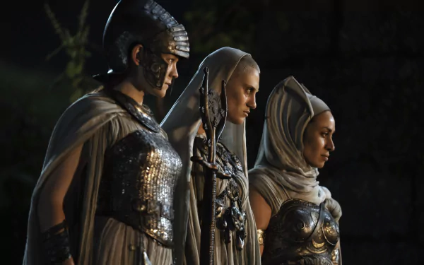 Three armored characters from The Lord of the Rings: The Rings of Power stand side by side in a detailed 4K Ultra HD desktop wallpaper from the TV show.