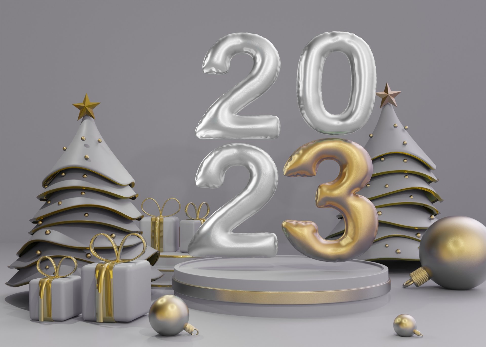 Holiday New Year 2023 2K Quad HD PC desktop wallpaper: silver 2023 balloons with a gold 3, white-and-gold stylized trees, wrapped gifts and ornaments on a gray pedestal backdrop.