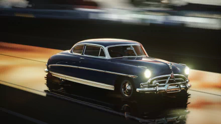 HD PC desktop wallpaper: glossy blue Hudson Hornet racing at Sebring in Assetto Corsa, cinematic motion blur and wet track reflections.