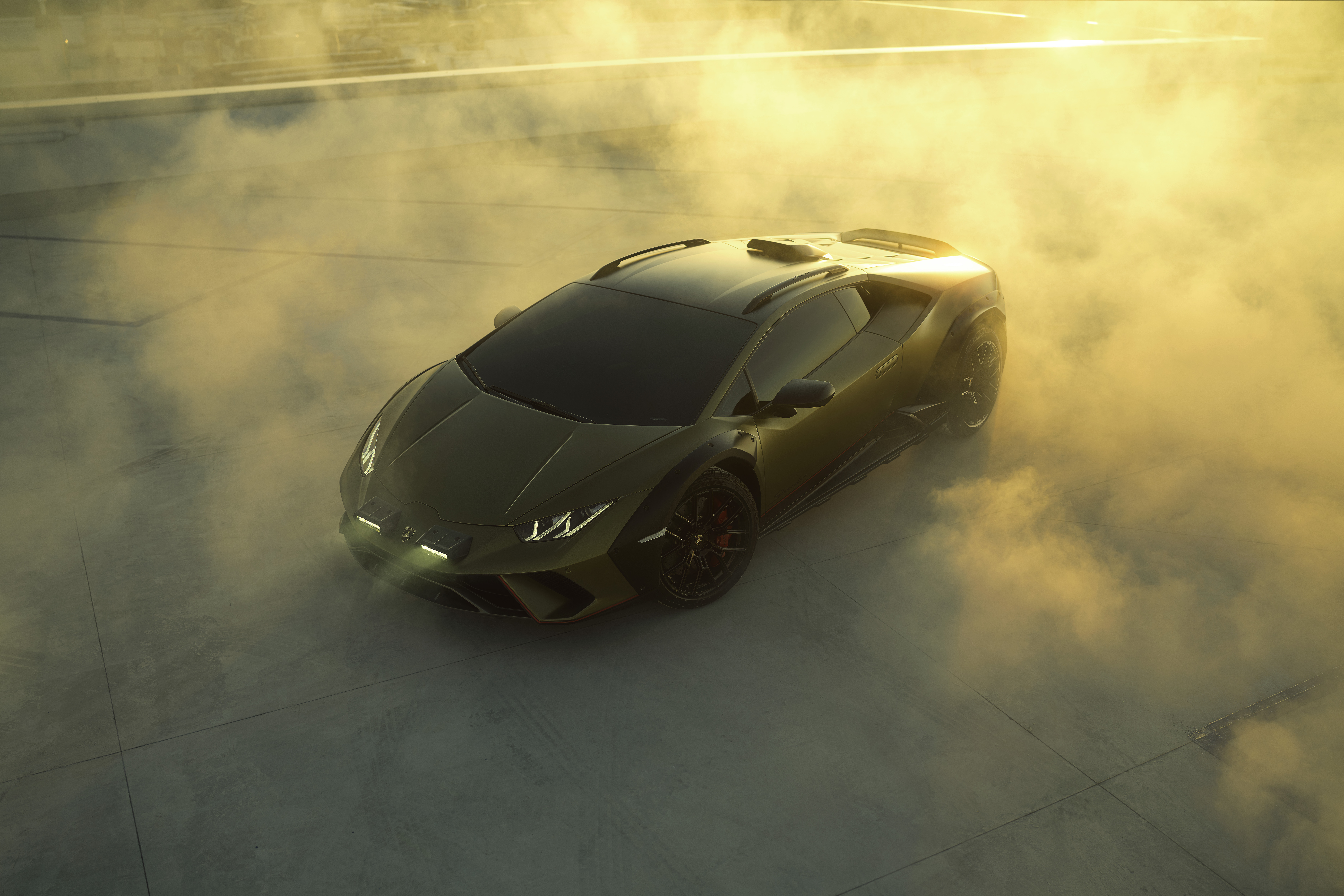 Lamborghini Huracán Sterrato HD desktop wallpaper and background featuring a stylish and powerful vehicle.
