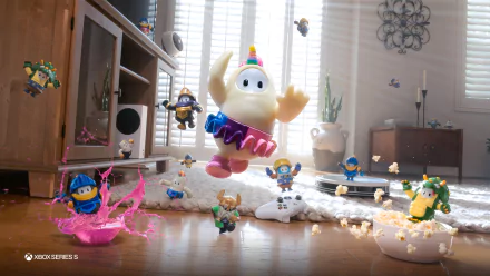 A vibrant HD desktop wallpaper featuring characters from the video game Fall Guys, showcasing playful antics in a cozy living room setting filled with snacks and gaming gear.