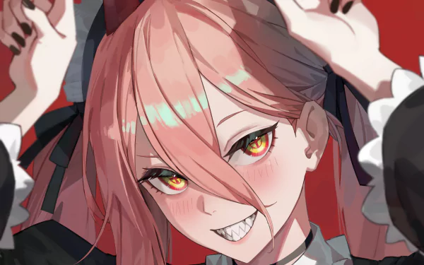 HD anime wallpaper featuring a close-up of a Chainsaw Man character with sharp yellow eyes, pink hair, and a mischievous grin against a red background.