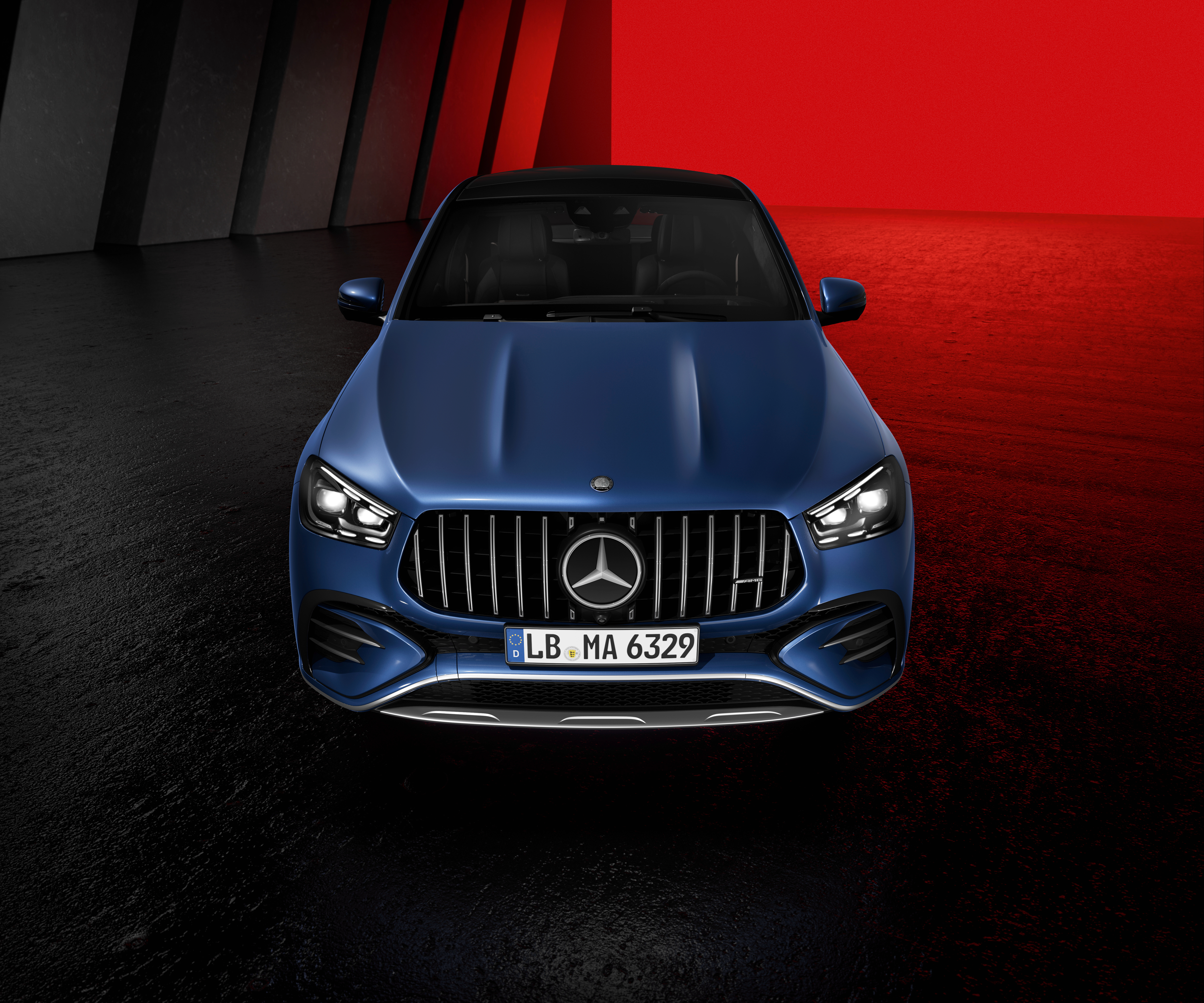 Mercedes-AMG GLE 53 in a dynamic HD desktop wallpaper setting.