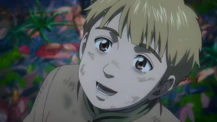 Thorfinn from Vinland Saga anime is depicted smiling with dirt on his face, rendered in stunning 8K Ultra HD for a vibrant PC desktop wallpaper.