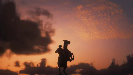 Silhouette of Arthur Morgan on horseback at sunrise — Red Dead Redemption 2 video game 4K Ultra HD PC desktop wallpaper.