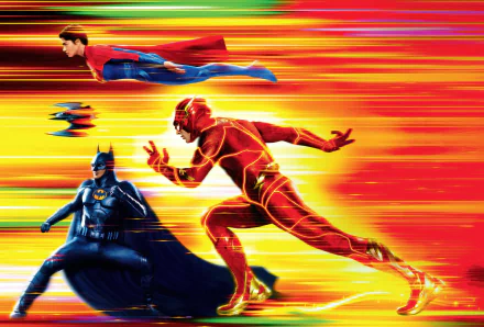 A vibrant 4K Ultra HD desktop wallpaper featuring characters from The Flash (2023) movie, including The Flash, Batman, and Superman in dynamic action poses.