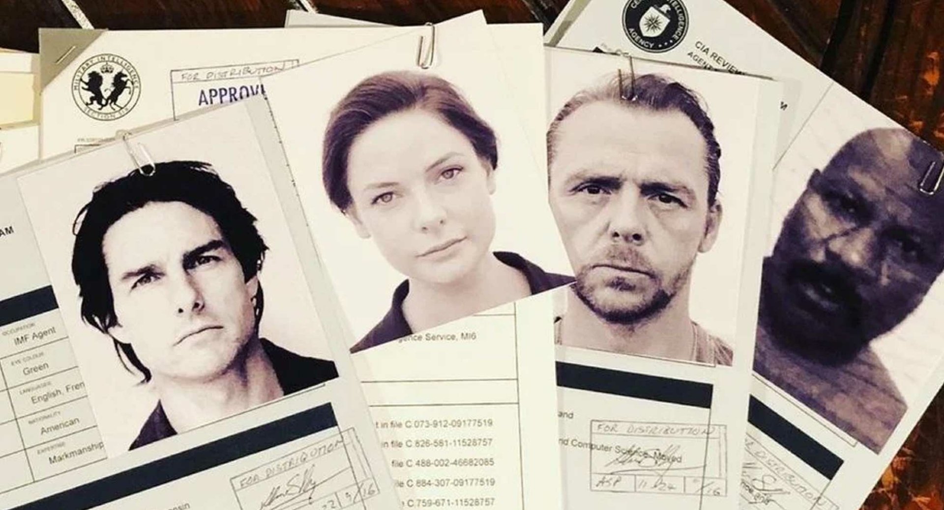 HD wallpaper featuring character profile dossiers from Mission: Impossible - Dead Reckoning Part One movie for desktop background.