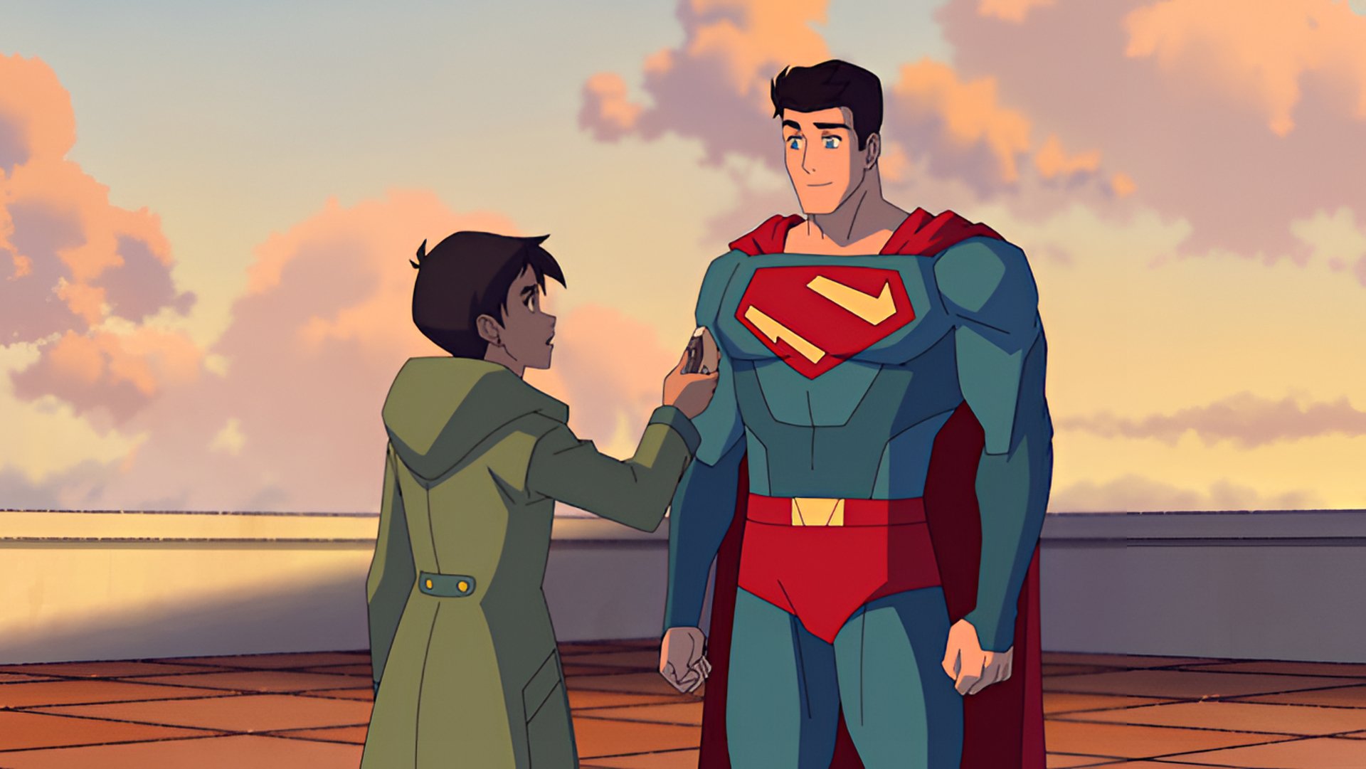 HD wallpaper featuring Superman and Lois Lane from the animated TV show My Adventures With Superman, set on a building rooftop at sunset.