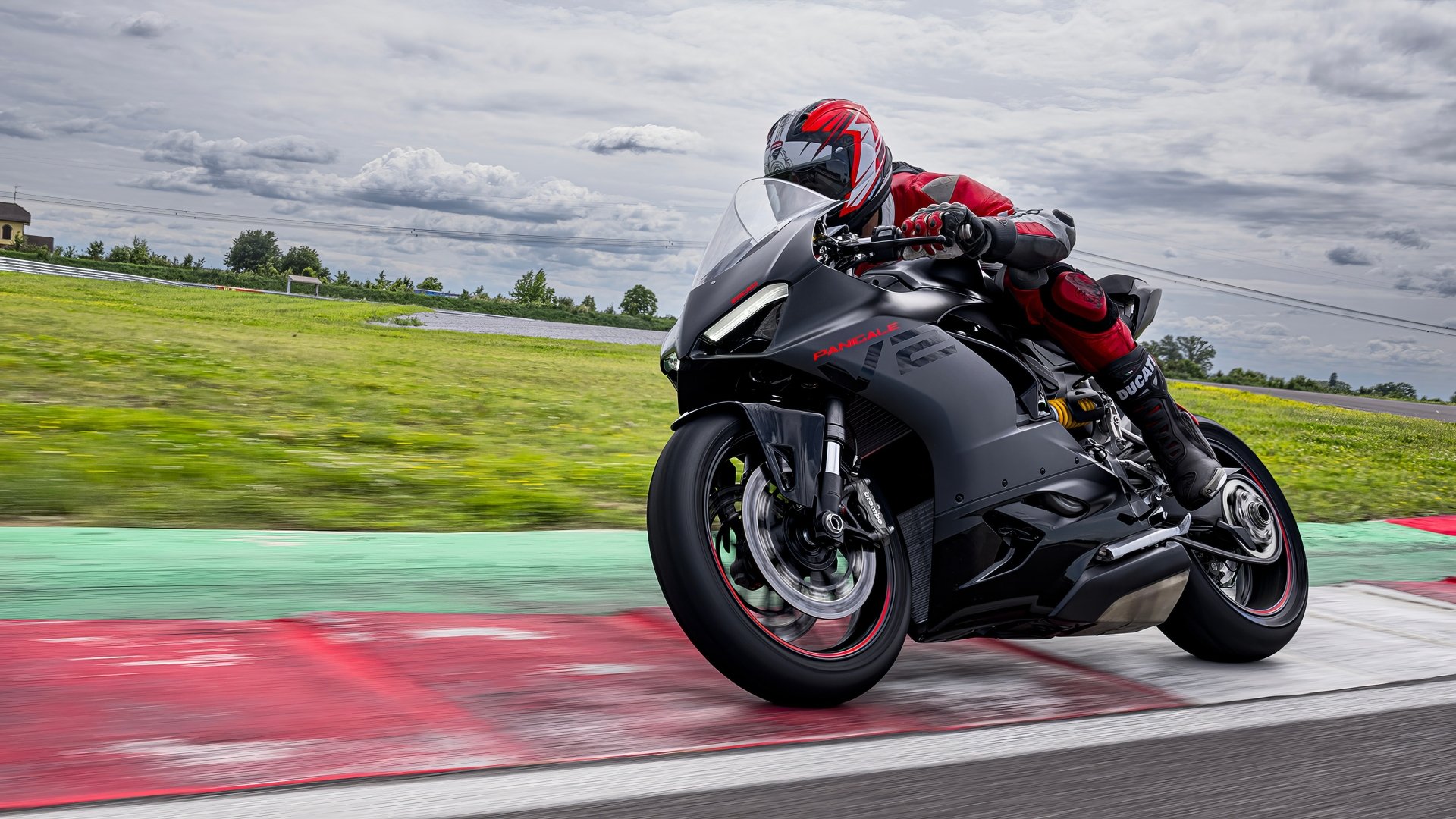 Ducati Panigale V2 motorcycle in action on racetrack, HD desktop wallpaper and background