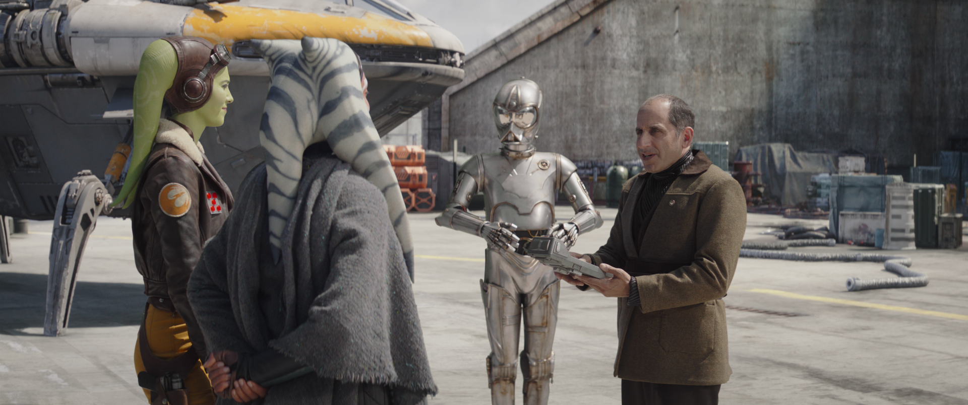 HD Wallpaper featuring Ahsoka with droid and character in a Star Wars-themed setting for desktop backgrounds.