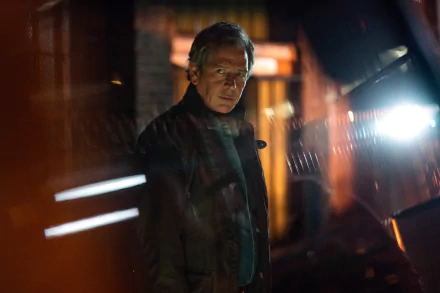 HD desktop wallpaper featuring a mysterious figure from Secret Invasion with dramatic lighting in the backdrop.