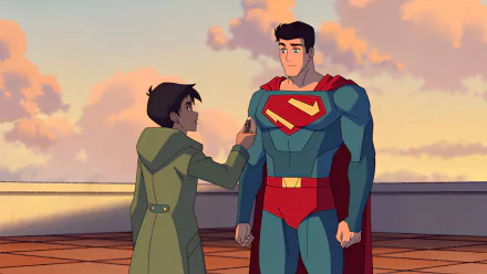 HD wallpaper featuring Superman and Lois Lane from the animated TV show My Adventures With Superman, set on a building rooftop at sunset.