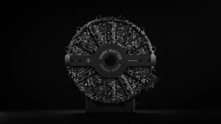 HD wallpaper featuring a detailed image of a Koenigsegg Gemera engine, captured in high contrast against a black background, emphasizing its complex design and craftsmanship.