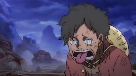 HD PC desktop wallpaper of Monkey D. Luffy from the One Piece anime: tearful, exhausted expression with tongue out, straw hat on his back against a rocky, moonlit background.