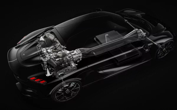 HD wallpaper of a Koenigsegg Gemera featuring a detailed transparent view of the engine and chassis on a black background.