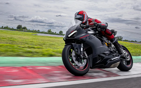 Ducati Panigale V2 motorcycle in action on racetrack, HD desktop wallpaper and background