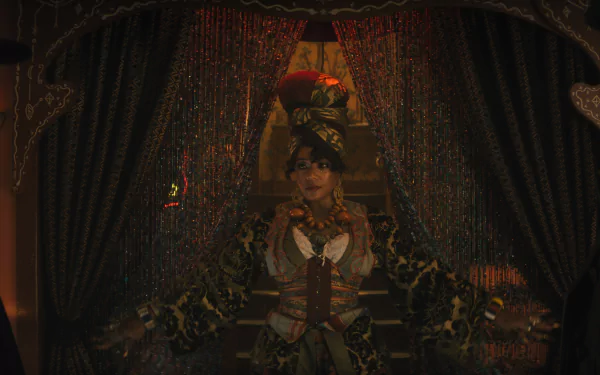 HD desktop wallpaper depicting a scene from the movie Haunted Mansion, featuring a character in a detailed, antique setting framed by heavy curtains.