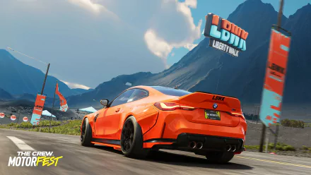 HD desktop wallpaper featuring a dynamic scene from The Crew Motorfest with a sleek orange sports car racing on a scenic mountain road.