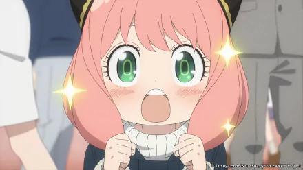 HD desktop wallpaper featuring Anya Forger from the anime Spy x Family, showing her excited expression with sparkling eyes.