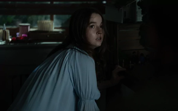 A suspenseful HD desktop wallpaper featuring a woman looking shocked and frightened in a dimly lit room with the ominous caption 'No One Will Save You'.