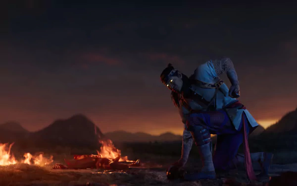 Liu Kang kneels beside a fire in this dynamic HD wallpaper from Mortal Kombat 1, set against a dramatic sunset backdrop with mountains in the distance.