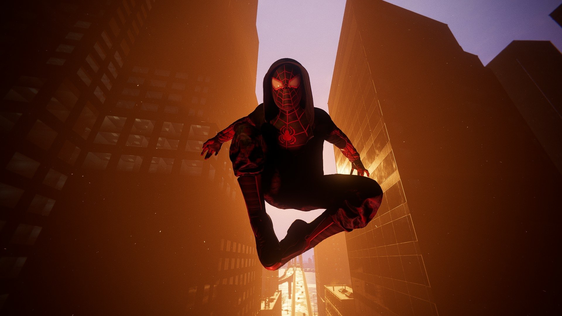 HD desktop wallpaper featuring Miles Morales as Spider-Man in a red and black suit, poised mid-air in a cityscape from Web of Spider-Man.