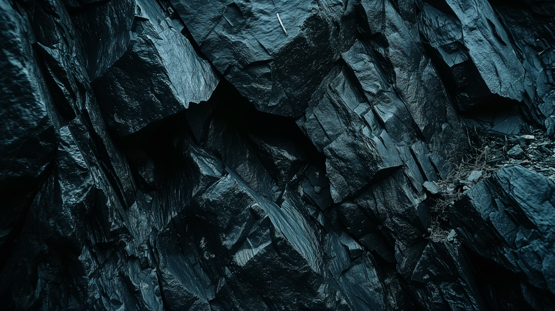 Dark aesthetic HD wallpaper featuring textured rock surface for desktop background.