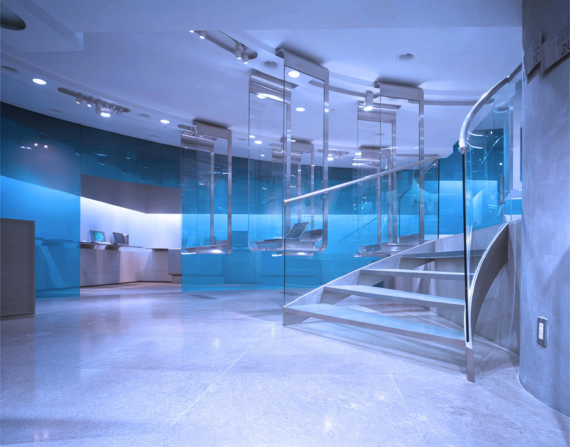 HD desktop wallpaper featuring a modern interior with Frutiger Aero style glass staircase and blue lighting.