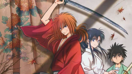 HD desktop wallpaper featuring characters Kenshin Himura and Kaoru Kamiya from Rurouni Kenshin anime, with a traditional Japanese backdrop and falling autumn leaves.