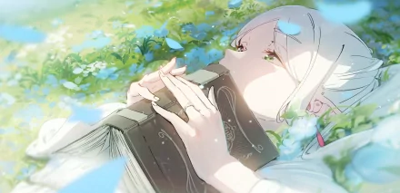 HD desktop wallpaper of Frieren from Frieren: Beyond Journey's End, showing her lying among flowers and holding a book. The scene captures a serene and reflective moment.