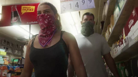 Jason from the video game Grand Theft Auto VI is depicted in this 4K Ultra HD PC desktop wallpaper, wearing a red bandana and a gray scarf inside a store.