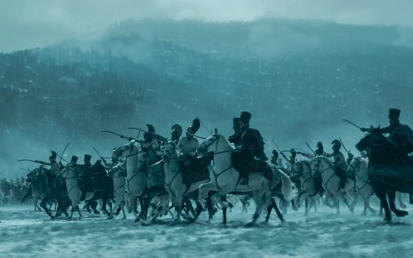 An epic scene from the movie Napoleon, featuring a dramatic cavalry charge through a misty landscape, captured in stunning HD, serves as a captivating desktop wallpaper.