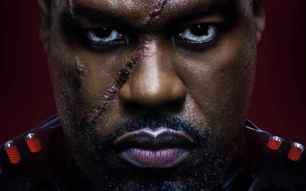 Intense close-up HD wallpaper featuring Aquaman and The Lost Kingdom character with a scarred face and determined look.