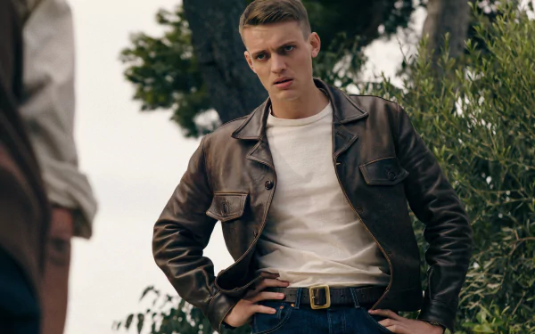 Confident character striking a pose from TV show Monsieur Spade for HD desktop wallpaper.