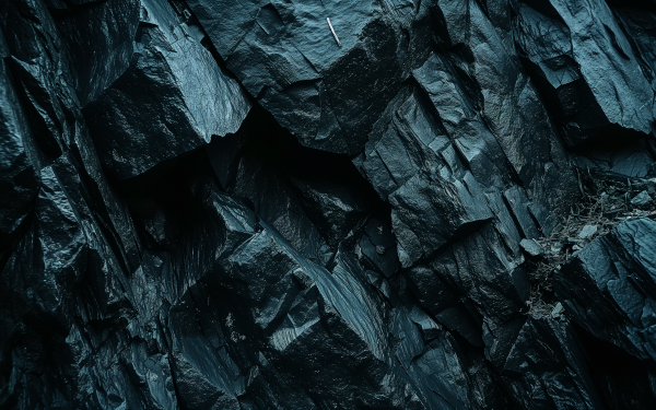 Dark aesthetic HD wallpaper featuring textured rock surface for desktop background.