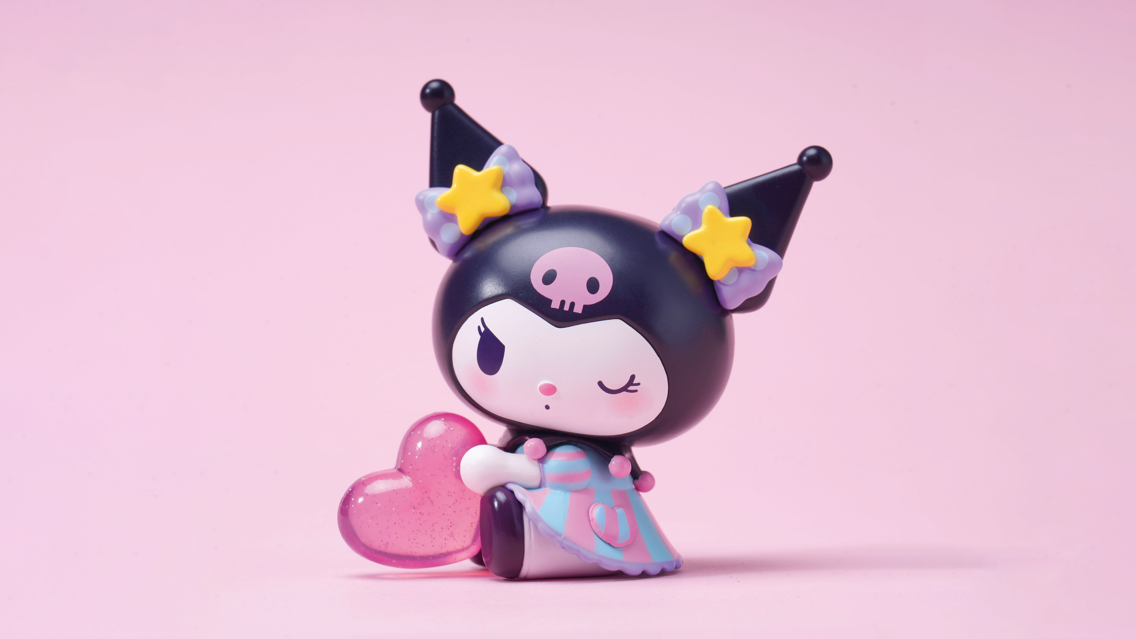 HD wallpaper featuring the kawaii character Kuromi from Onegai My Melody against a pink background, perfect for anime and Sanrio fans' desktops.