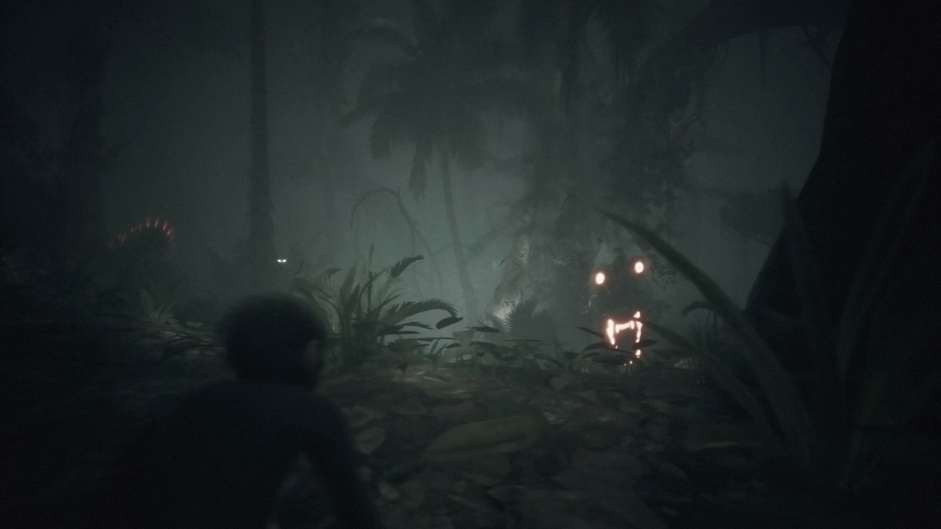 HD desktop wallpaper from Ancestors: The Humankind Odyssey video game depicting a prehistoric environment shrouded in mist with a primate character exploring the dense jungle foliage.