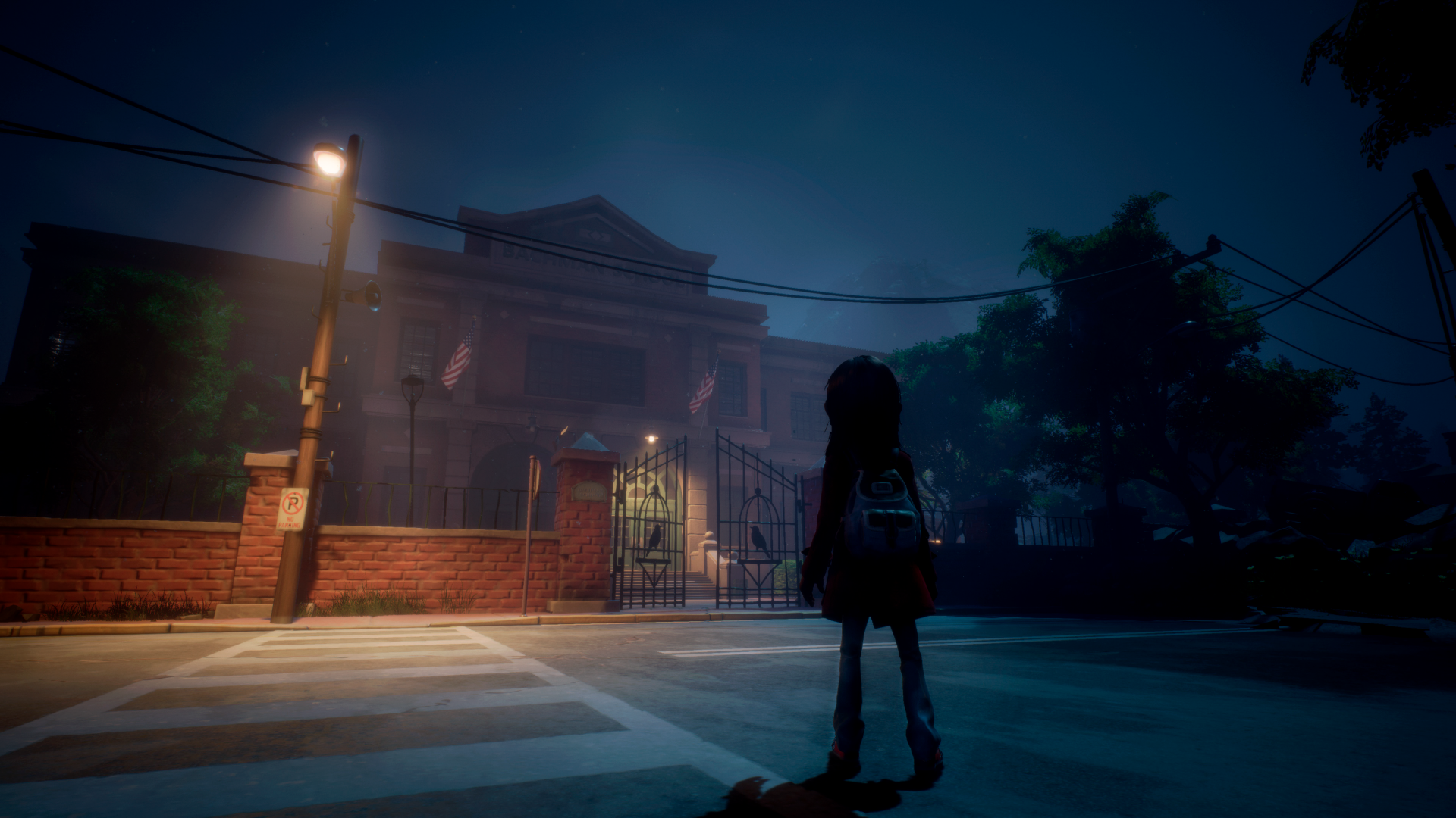 HD wallpaper of a scene from the video game Gylt featuring a silhouetted character standing before a dimly lit school gate on a foggy night.