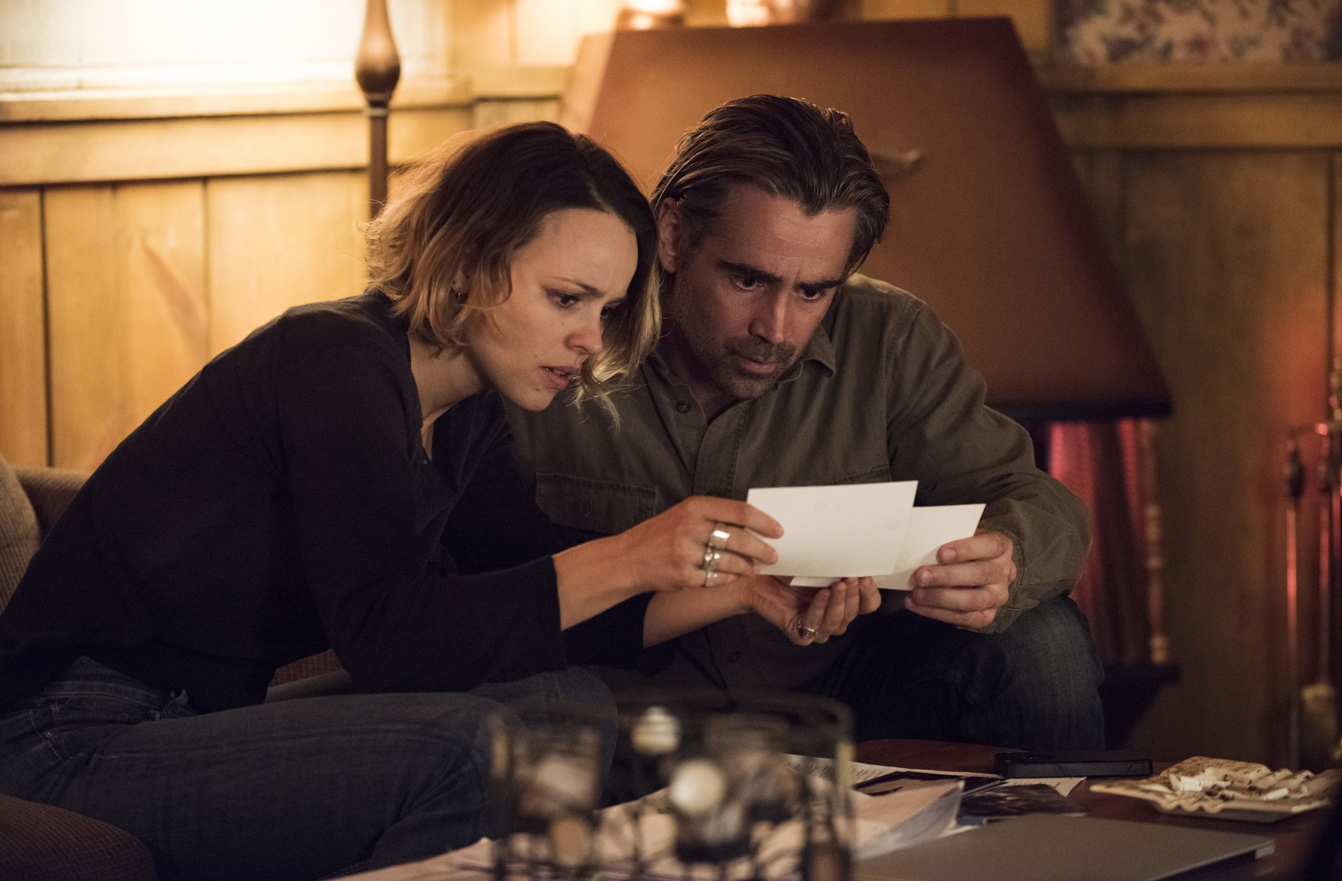 Two actors examining a document intently in a scene from the TV Show True Detective, a HD desktop wallpaper and background.