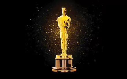 HD wallpaper of an Oscar trophy sparkling against a black background, symbolizing the Academy Awards.