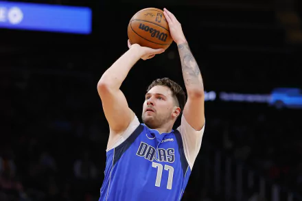 Dallas Mavericks player in blue jersey shooting basketball - HD NBA wallpaper.