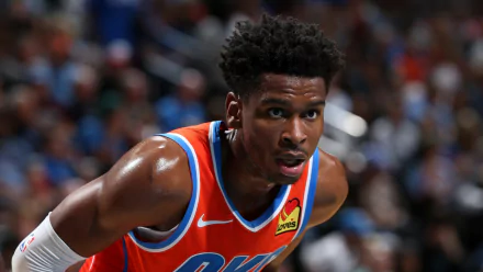 HD wallpaper of a focused Oklahoma City Thunder player in action, representing the team with intensity.